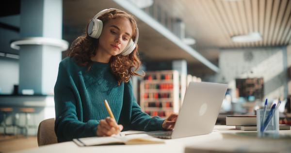 Image of woman working on laptop