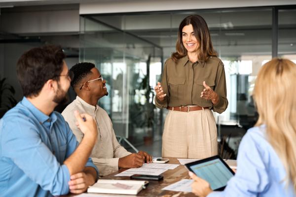 Image of employees at a board meeting 