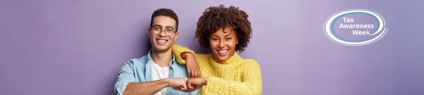 A diverse couple fistbumping and looking direct to camera, with the Tax Awareness Week logo