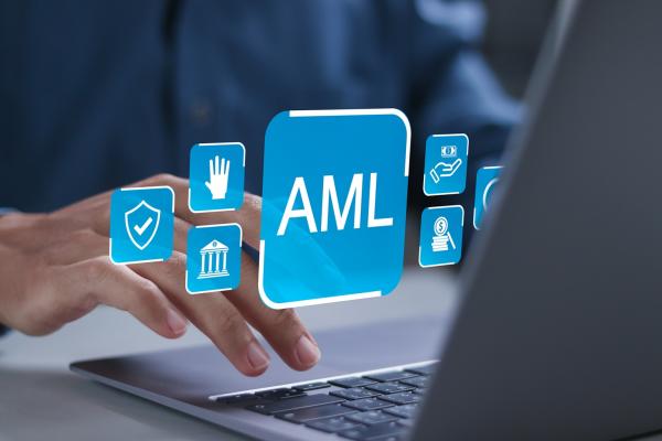 AML and other icons above a laptop