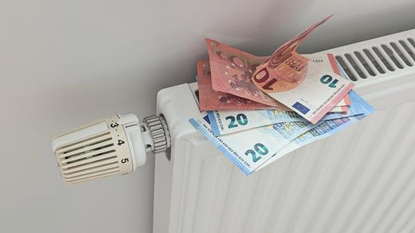 Radiator with banknotes on top